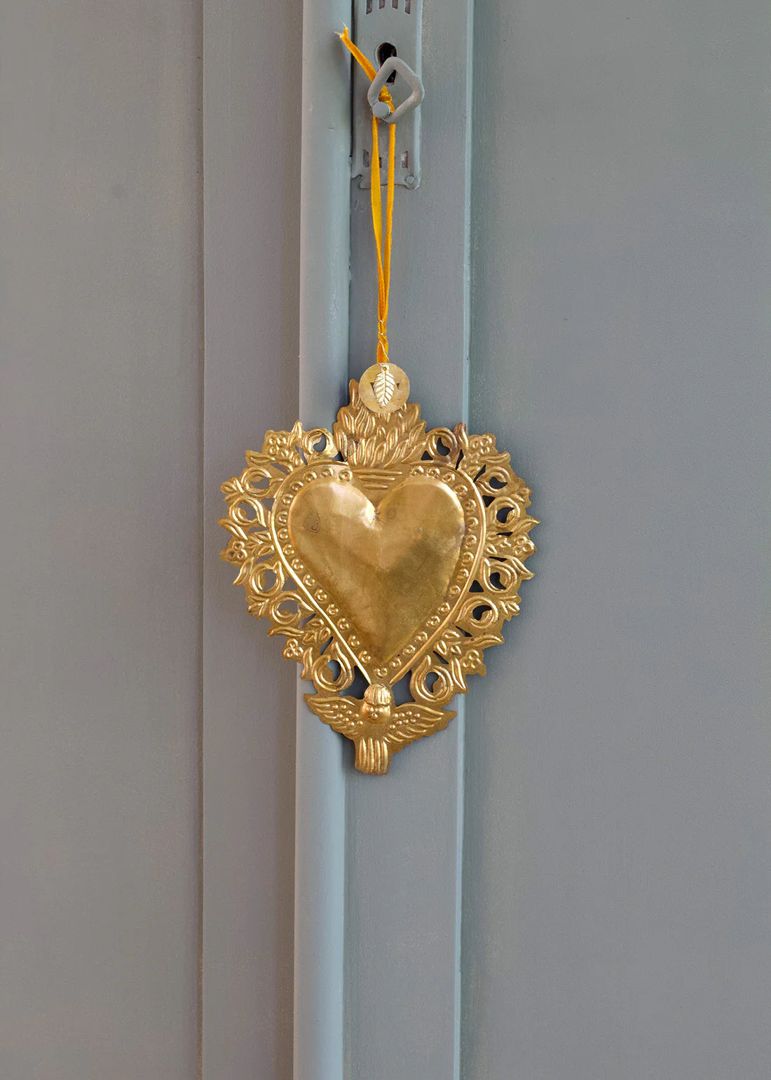 Cuore Sacro in ottone con angelo